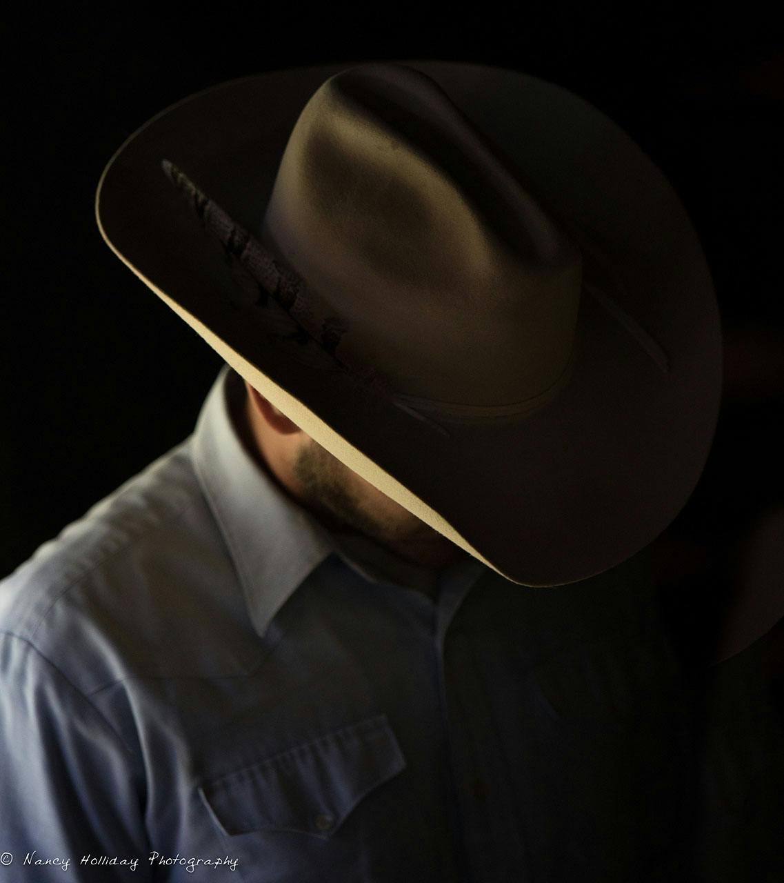 Rim light on cowboy hat  Absarokas